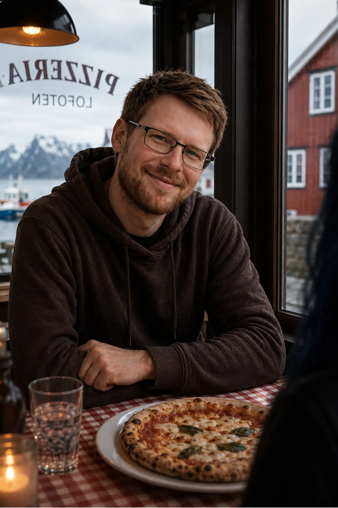 Oskari at his favorite pizzeria in the Lofoten Islands.
